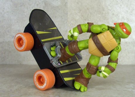 Skateboard with mike wheelie