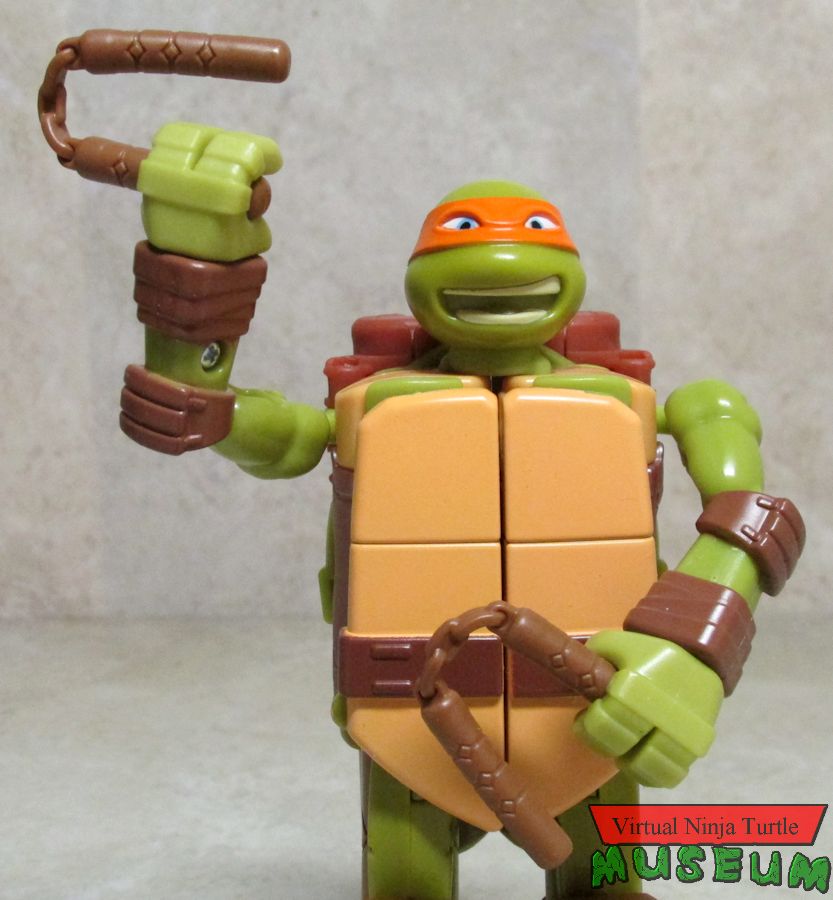 Ninja Turtle into Weapon Michelangelo with weapons