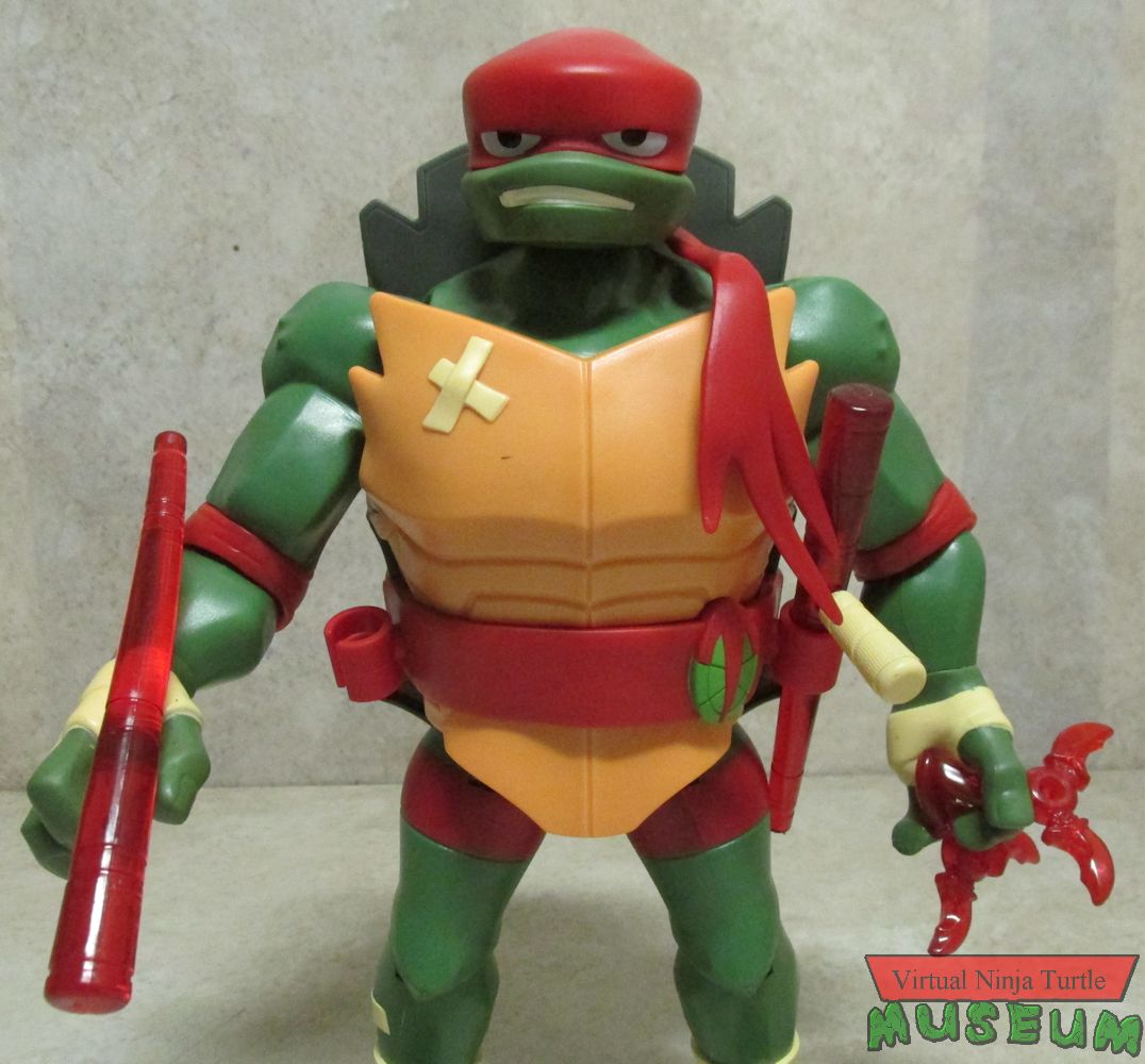 Giant Raphael with weapons