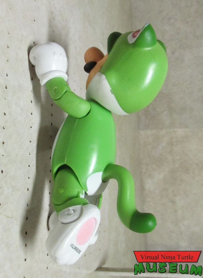 Cat Luigi climbing the wall