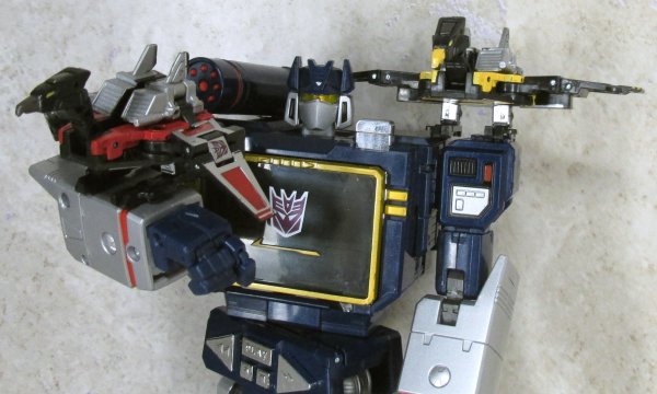 Laserbeak and Buzzsaw perched